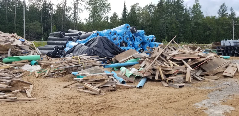 Geomembrane liner Electric Leak Location Testing Pile of waste on a jobsite